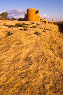 Colorado: Hovenweep National Monument, ruined Anasazi “Hovenweep Castle” on edge of slickrock (bentonite) in foreground