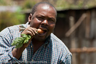 Carrot farmer eating his carrot