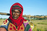 Equator Group Collection, Mrs. Eunice Muthoni, dairy farmer, at equator collection center.