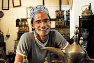 Merchant selling antiques in Stone Town