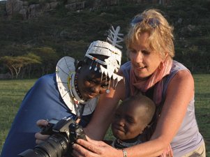 sharing photos with Maasai girls